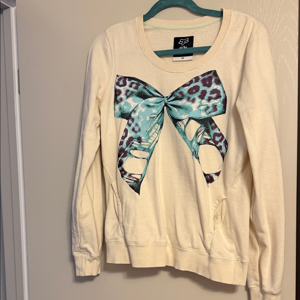 Fox Cream Sweater with Blue and Purple Bow Design